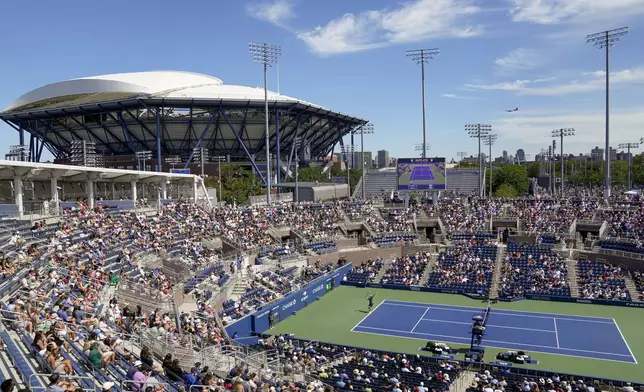 John Isner, of the United States, returns a shot to Michael Mmoh, of the United States, during the second round of the U.S. Open tennis championships, Thursday, Aug. 31, 2023, in New York. The 2024 U.S. Open begins Monday, Aug. 26. (AP Photo/John Minchillo, File)