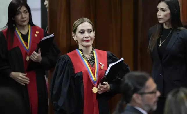 Supreme Court President Caryslia Rodriguez arrives at the Court which is performing an audit of the disputed results of the presidential election in Caracas, Venezuela, Thursday, Aug. 22, 2024. (AP Photo/Ariana Cubillos)