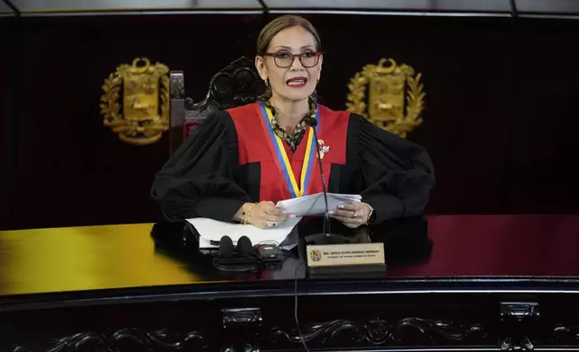 Supreme Court President Caryslia Rodriguez speaks at the Court which is performing an audit of the disputed results of the presidential election in Caracas, Venezuela, Thursday, Aug. 22, 2024. (AP Photo/Ariana Cubillos)