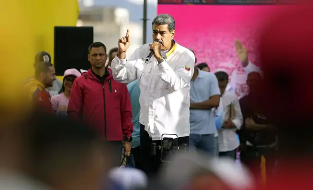 President Nicolas Maduro speaks to supporters during a government rally in Caracas, Venezuela, Saturday, Aug. 3, 2024. (AP Photo/Matias Delacroix)