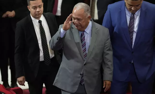 National Electoral Council President Elvis Amoroso arrives to the Supreme Court which is performing an audit of the disputed results of the presidential election in Caracas, Venezuela, Thursday, Aug. 22, 2024. (AP Photo/Ariana Cubillos)