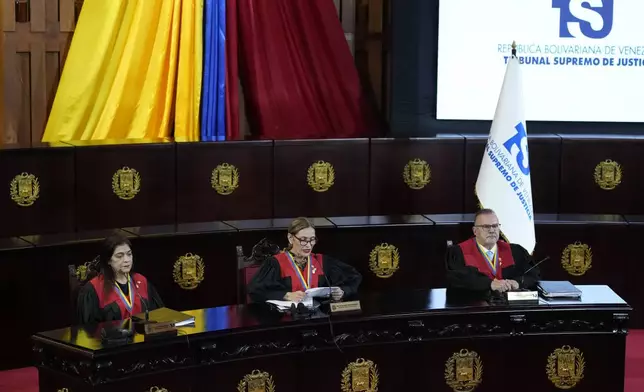 Supreme Court President Caryslia Rodriguez speaks at the Court which is performing an audit of the disputed results of the presidential election in Caracas, Venezuela, Thursday, Aug. 22, 2024. (AP Photo/Ariana Cubillos)