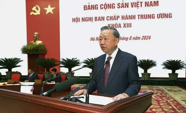 Vietnamese President To Lam delivers a speech during a news conference held by the Central Committee of the Communist Party, which elected Lam as the new Communist Party Chief, the country’s most power role, on Saturday, Aug. 3, 2024, Hanoi, Vietnam. (Duong Van Giang/VNA via AP)