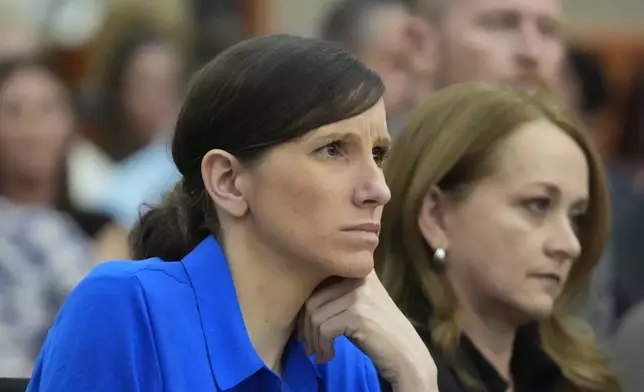 Kouri Richins, a Utah mother of three who wrote a children's book about coping with grief after her husband's death and was later accused of fatally poisoning him, looks on during a court hearing Tuesday, Aug. 27, 2024, in Park City, Utah. (AP Photo/Rick Bowmer, Pool)