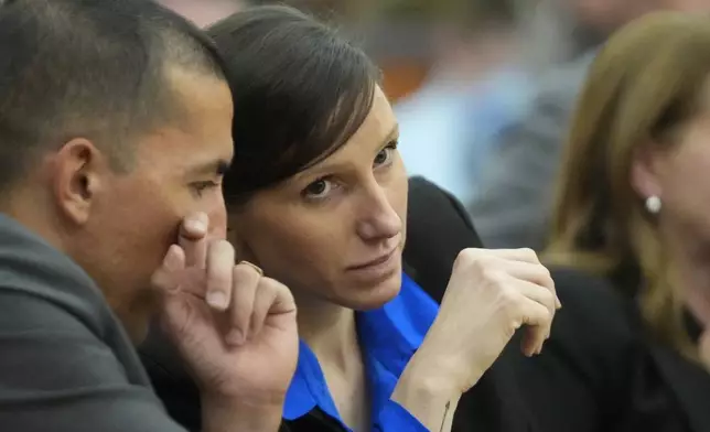 Kouri Richins, a Utah mother of three who wrote a children's book about coping with grief after her husband's death and was later accused of fatally poisoning him, looks on during a court hearing Tuesday, Aug. 27, 2024, in Park City, Utah. (AP Photo/Rick Bowmer, Pool)