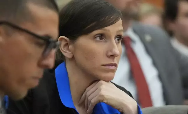 Kouri Richins, a Utah mother of three who wrote a children's book about coping with grief after her husband's death and was later accused of fatally poisoning him, looks on during a hearing Tuesday, Aug. 27, 2024, in Park City, Utah. (AP Photo/Rick Bowmer, Pool)