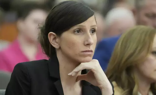 Kouri Richins, a Utah mother of three who wrote a children's book about coping with grief after her husband's death and was later accused of fatally poisoning him, looks on during a hearing Monday, Aug. 26, 2024, in Park City, Utah. (AP Photo/Rick Bowmer, Pool)