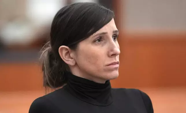 FILE - Kouri Richins, a Utah mother of three, who wrote a children's book about coping with grief after her husband's death and was later accused of fatally poisoning him, looks on during a hearing, May 15, 2024, in Park City, Utah. (AP Photo/Rick Bowmer, Pool, File)