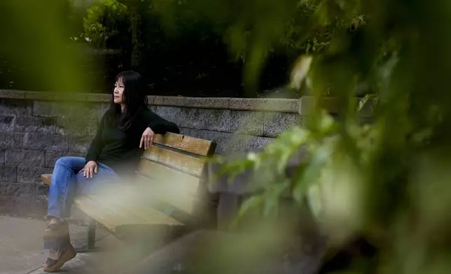 Ellen Lo Hoffman, the co-founder of Soul Reparations, a nonprofit providing free spiritual support to women, poses for a portrait near her home Wednesday, Aug. 21, 2024, in Bothell, Wash. (AP Photo/Lindsey Wasson)