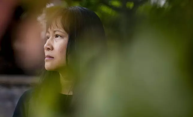 Ellen Lo Hoffman, the co-founder of Soul Reparations, a nonprofit providing free spiritual support to women, poses for a portrait near her home Wednesday, Aug. 21, 2024, in Bothell, Wash. (AP Photo/Lindsey Wasson)