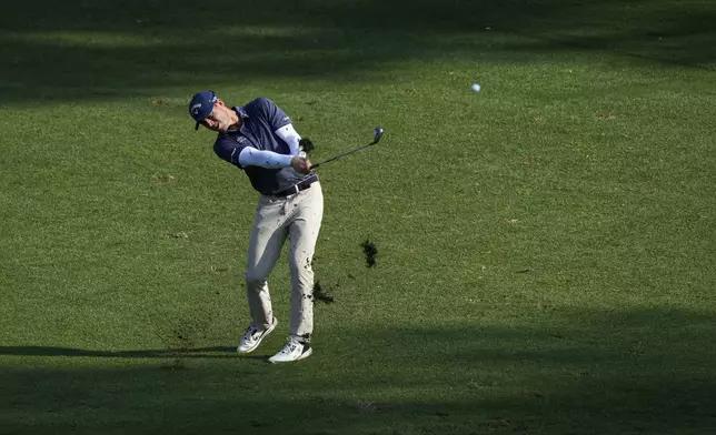 Max Greyserman hits to the ninth green during the final round of the Wyndham Championship golf tournament in Greensboro, N.C., Sunday, Aug. 11, 2024. (AP Photo/Chuck Burton)