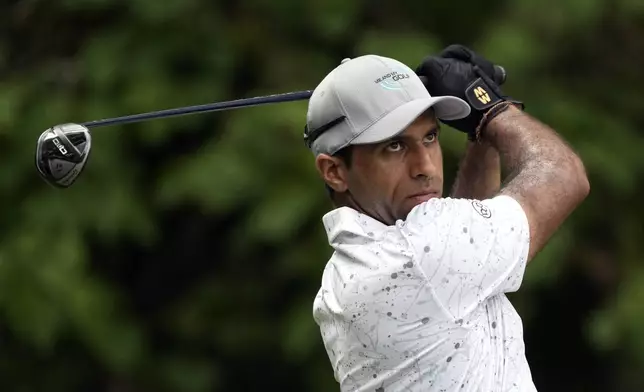 Aaron Rai, of England, watches his tee shot on the second hole during the final round of the Wyndham Championship golf tournament in Greensboro, N.C., Sunday, Aug. 11, 2024. (AP Photo/Chuck Burton)