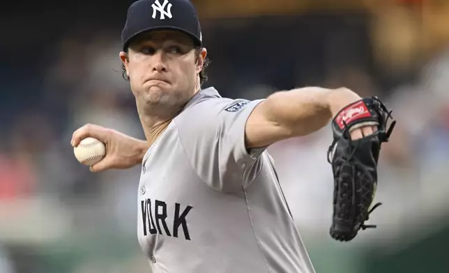 New York Yankees pitcher Gerrit Cole throws during the first inning of a baseball game against the Washington Nationals, Tuesday, Aug. 27, 2024, in Washington. (AP Photo/John McDonnell)