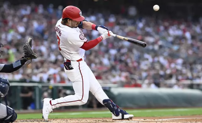 Washington Nationals' Dylan Crews flies out during the first inning of a baseball game against the New York Yankees, Monday, Aug. 26, 2024, in Washington. (AP Photo/Nick Wass)