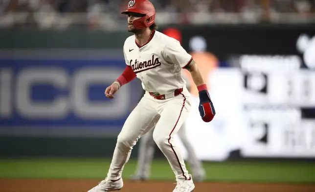 Washington Nationals' Dylan Crews takes a lead from first base during the fourth inning of a baseball game against the New York Yankees, Monday, Aug. 26, 2024, in Washington. (AP Photo/Nick Wass)