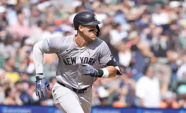 New York Yankees' Aaron Judge doubles during the ninth inning of a baseball game against the Detroit Tigers, Saturday, Aug. 17, 2024, in Detroit. (AP Photo/Carlos Osorio)