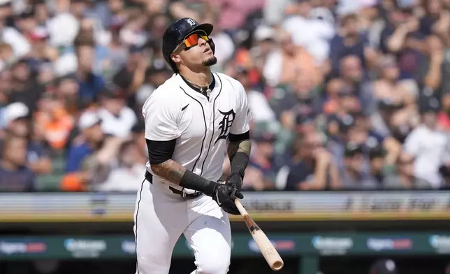 Detroit Tigers' Javier Báez watches his fly out during the eighth inning of a baseball game against the New York Yankees, Saturday, Aug. 17, 2024, in Detroit. (AP Photo/Carlos Osorio)