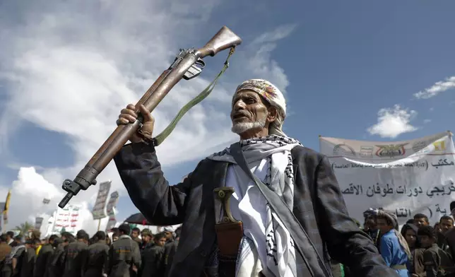 Houthi supporters attend an anti-Israel and anti-US rally in Sanaa, Yemen, Friday, Aug. 23, 2024. (AP Photo/Osamah Abdulrahman)