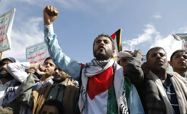 Houthi supporters attend an anti-Israel and anti-US rally in Sanaa, Yemen, Friday, Aug. 23, 2024. (AP Photo/Osamah Abdulrahman)