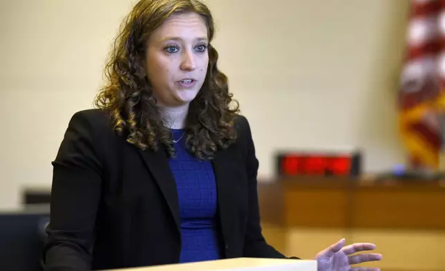 Assistant Attorney General Audriana Mekula gives the opening statement in the Victor Malavet trial at Merrimack County Superior Court in Concord, N.H., Monday, Aug. 26, 2024. Malavet, a former state employee, is charged in connection with the attorney general's probe of the Sununu Youth Services Center in Manchester. (David Lane/Union Leader via AP, Pool)