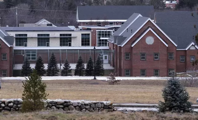 FILE - The Sununu Youth Services Center is seen amongst the trees on Jan. 28, 2020, in Manchester, N.H. (AP Photo/Charles Krupa, File)