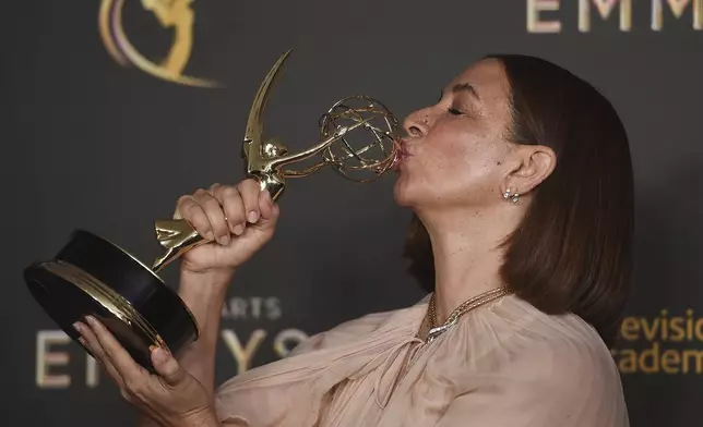 Maya Rudolph kisses her trophy for outstanding character voice-over performance on “Big Mouth" on night one of the Creative Arts Emmy Awards on Saturday, Sept. 7, 2024, in Los Angeles. (Photo by Richard Shotwell/Invision/AP)