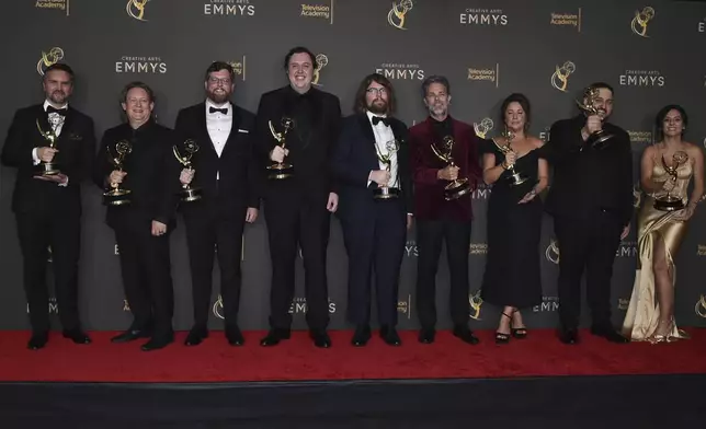 From left, Brian J. Armstrong, Benjamin Cook, James Gallivan, John Creed, Mark Hailstone, Ken Cain, Melissa Muil, Matt Salib and Sanaa Kelley pose with the award for Outstanding Sound Editing for a Comedy or Drama Series (One-Hour) for Shogun during night two of the Creative Arts Emmy Awards on Sunday, Sept. 8, 2024, in Los Angeles. (Photo by Richard Shotwell/Invision/AP)