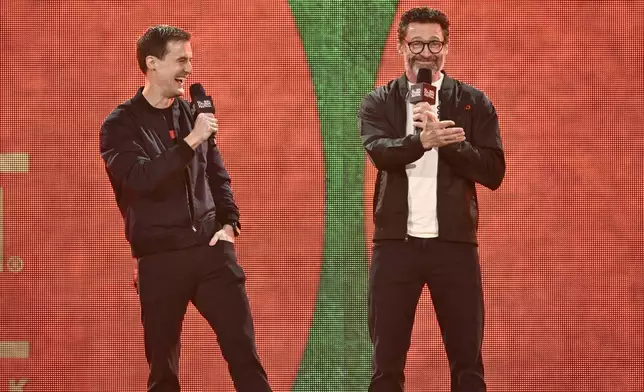 Global Citizen co-founder Hugh Evans, left, and Hugh Jackman speak during the Global Citizen Festival on Saturday, Sept. 28, 2024, at Central Park in New York. (Photo by Evan Agostini/Invision/AP)