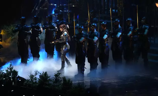 Chappell Roan, center, performs "Good Luck, Babe" during the MTV Video Music Awards on Wednesday, Sept. 11, 2024, at UBS Arena in Elmont, N.Y. (Photo by Charles Sykes/Invision/AP)