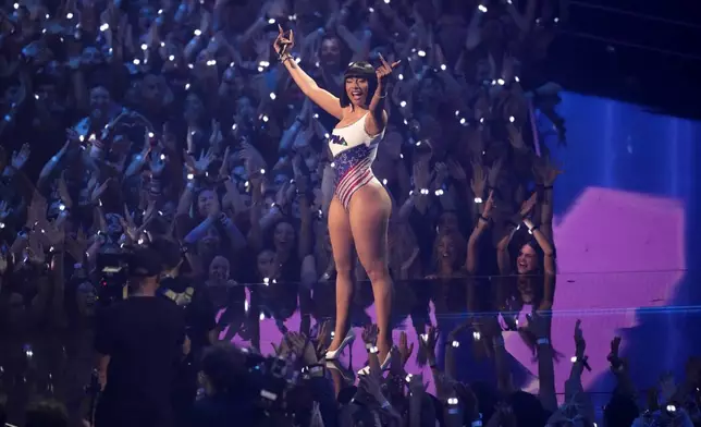 Host Megan Thee Stallion speaks during the MTV Video Music Awards on Wednesday, Sept. 11, 2024, at UBS Arena in Elmont, N.Y. (Photo by Charles Sykes/Invision/AP)