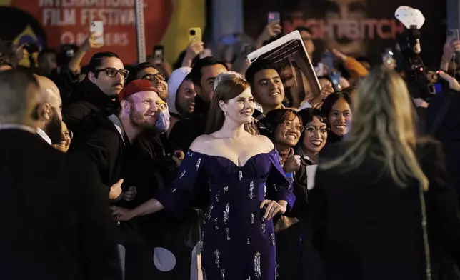 Amy Adams arrives on the red carpet for the premiere of 'Nightbitch' at Princess of Wales Theatre, during the Toronto International Film Festival in Toronto, on Saturday, Sept. 7, 2024. (Cole Burston/The Canadian Press via AP)