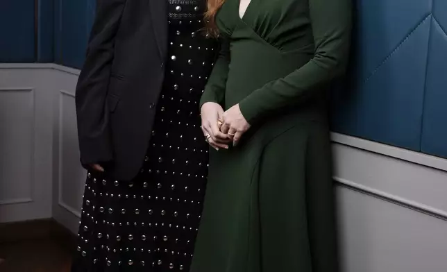 Marielle Heller, left, the writer/director of "Nightbitch," and the film's star Amy Adams pose for a portrait during the Toronto International Film Festival, Sunday, Sept. 8, 2024, in Toronto. (AP Photo/Chris Pizzello)