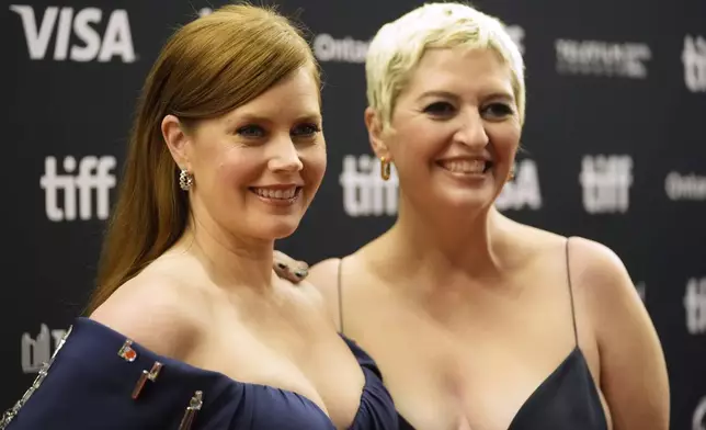 Amy Adams, left, and director Marielle Heller attend the premiere of "Nightbitch" at Princess of Wales Theatre during the Toronto International Film Festival on Saturday, Sept. 7, 2024, in Toronto. (AP Photo/Chris Pizzello)