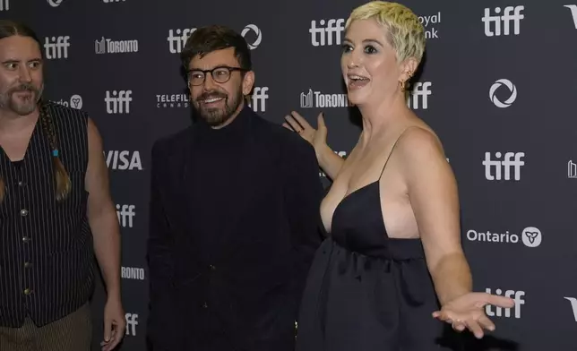 Nate Heller, from left, Jorma Taccone, and director Marielle Heller attend the premiere of "Nightbitch" at Princess of Wales Theatre during the Toronto International Film Festival on Saturday, Sept. 7, 2024, in Toronto. (AP Photo/Chris Pizzello)