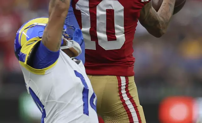 San Francisco 49ers wide receiver Ronnie Bell (10) cannot catch a pass over Los Angeles Rams cornerback Cobie Durant during the second half of an NFL football game, Sunday, Sept. 22, 2024, in Inglewood, Calif. (AP Photo/Ryan Sun)