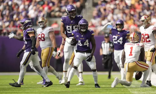 Minnesota Vikings safety Josh Metellus (44) celebrates after making a tackle during the second half of an NFL football game against the San Francisco 49ers, Sunday, Sept. 15, 2024, in Minneapolis. (AP Photo/Abbie Parr)