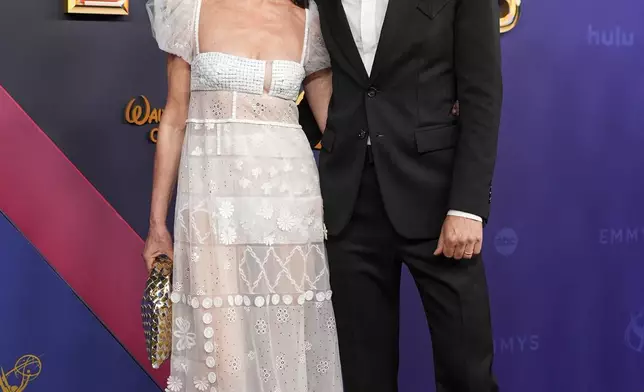 Yelena Yemchuk, left, and Ebon Moss-Bachrach arrive at the 76th Primetime Emmy Awards on Sunday, Sept. 15, 2024, at the Peacock Theater in Los Angeles. (AP Photo/Jae C. Hong)