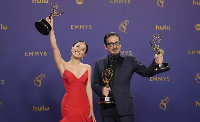 Anna Sawai, left, winner of the award for outstanding lead actress in a drama series for "Shogun", and Hiroyuki Sanada, winner of the awards for outstanding lead actor in a drama series, and outstanding drama series for "Shogun" pose in the press room during the 76th Primetime Emmy Awards on Sunday, Sept. 15, 2024, at the Peacock Theater in Los Angeles. (AP Photo/Jae C. Hong)