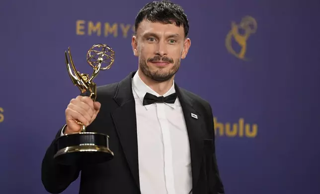 Richard Gadd poses in the press room with the award for outstanding writing for a limited or anthology series or movie for "Baby Reindeer" during the 76th Primetime Emmy Awards on Sunday, Sept. 15, 2024, at the Peacock Theater in Los Angeles. (AP Photo/Jae C. Hong)