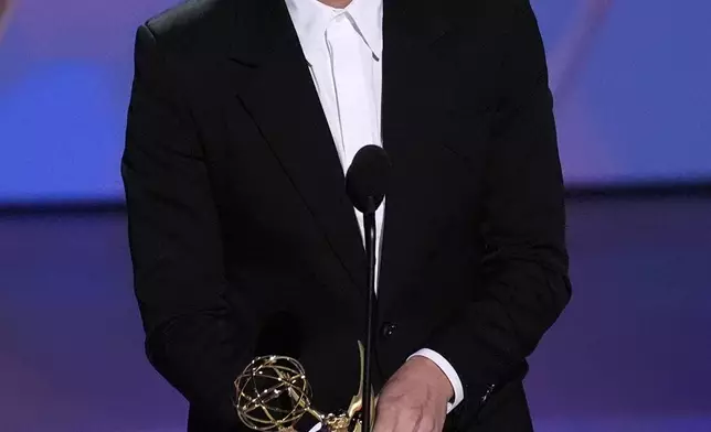 Ebon Moss-Bachrach accepts the award for outstanding supporting actor in a comedy series for "The Bear" during the 76th Primetime Emmy Awards on Sunday, Sept. 15, 2024, at the Peacock Theater in Los Angeles. (AP Photo/Chris Pizzello)