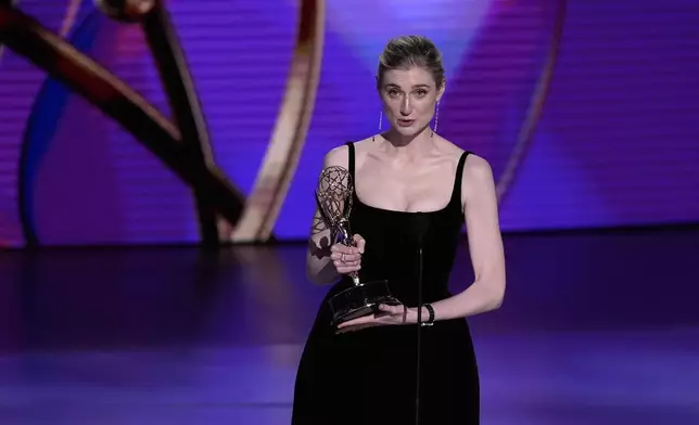 Elizabeth Debicki accepts the award for outstanding supporting actress in a drama series for "The Crown" during the 76th Primetime Emmy Awards on Sunday, Sept. 15, 2024, at the Peacock Theater in Los Angeles. (AP Photo/Chris Pizzello)