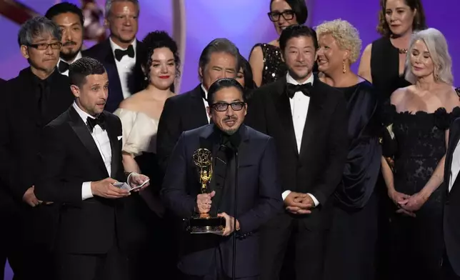 Justin Marks, center, and Hiroyuki Sanada, center right, and the team from "Shogun" accepts the award for outstanding drama series during the 76th Primetime Emmy Awards on Sunday, Sept. 15, 2024, at the Peacock Theater in Los Angeles. (AP Photo/Chris Pizzello)