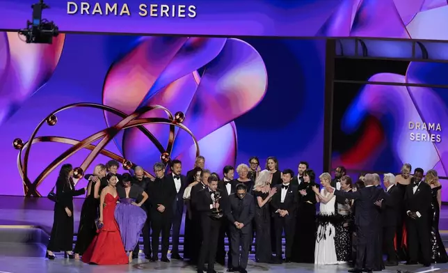 Justin Marks, left center, and Hiroyuki Sanada, center right, and the team from "Shogun" accepts the award for outstanding drama series during the 76th Primetime Emmy Awards on Sunday, Sept. 15, 2024, at the Peacock Theater in Los Angeles. (AP Photo/Chris Pizzello)