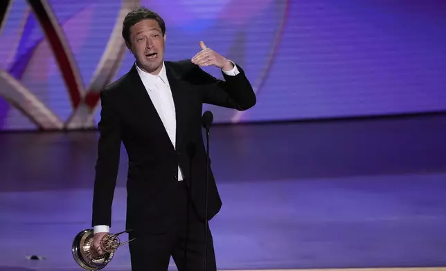 Ebon Moss-Bachrach accepts the award for outstanding supporting actor in a comedy series for "The Bear" during the 76th Primetime Emmy Awards on Sunday, Sept. 15, 2024, at the Peacock Theater in Los Angeles. (AP Photo/Chris Pizzello)