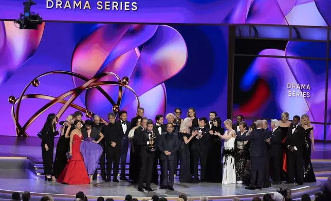 Justin Marks, left center, and Hiroyuki Sanada, center right, and the team from "Shogun" accepts the award for outstanding drama series during the 76th Primetime Emmy Awards on Sunday, Sept. 15, 2024, at the Peacock Theater in Los Angeles. (AP Photo/Chris Pizzello)