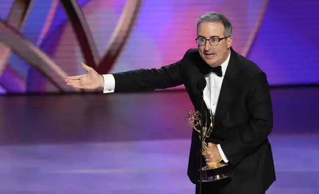 John Oliver accepts the award for outstanding scripted variety series for "Last Week Tonight With John Oliver" during the 76th Primetime Emmy Awards on Sunday, Sept. 15, 2024, at the Peacock Theater in Los Angeles. (AP Photo/Chris Pizzello)