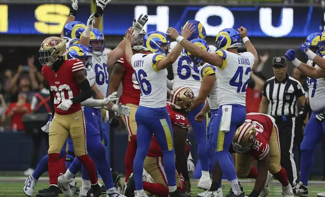 Los Angeles Rams place kicker Joshua Karty (16) celebrates with teammates after kicking a field goal against the San Francisco 49ers during the second half of an NFL football game, Sunday, Sept. 22, 2024, in Inglewood, Calif. (AP Photo/Ryan Sun)