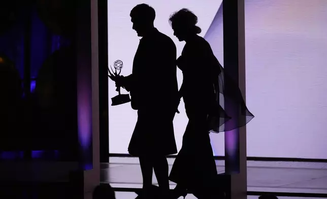 Richard Gadd, left, accept the award for outstanding limited or anthology series for "Baby Reindeer" and Jean Smart during the 76th Primetime Emmy Awards on Sunday, Sept. 15, 2024, at the Peacock Theater in Los Angeles. (AP Photo/Chris Pizzello)