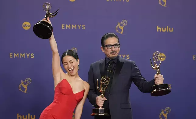 Anna Sawai, left, winner of the award for outstanding lead actress in a drama series for "Shogun", and Hiroyuki Sanada, winner of the awards for outstanding lead actor in a drama series, and outstanding drama series for "Shogun" pose in the press room during the 76th Primetime Emmy Awards on Sunday, Sept. 15, 2024, at the Peacock Theater in Los Angeles. (AP Photo/Jae C. Hong)