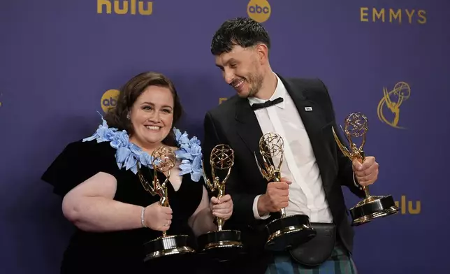 Jessica Gunning, left, winner of the awards for outstanding supporting actress in a limited or anthology series or movie, and outstanding limited or anthology series for "Baby Reindeer", and Richard Gadd, winner of the awards for outstanding lead actor in a limited or anthology series or movie, and outstanding limited or anthology series for "Baby Reindeer", pose in the press room during the 76th Primetime Emmy Awards on Sunday, Sept. 15, 2024, at the Peacock Theater in Los Angeles. (AP Photo/Jae C. Hong)